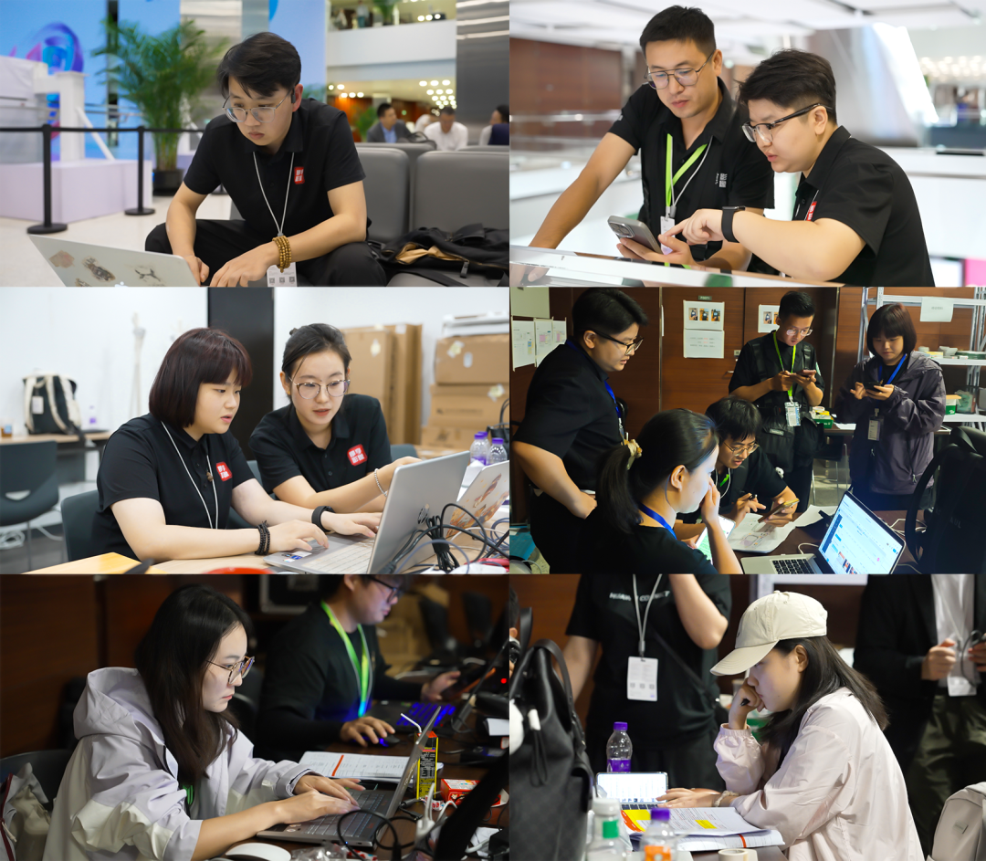 即享影像工作人员在大会现场沟通并操作电脑